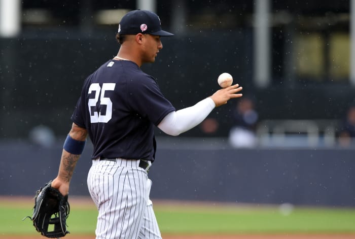 Gleyber Torres at shortstop with baseball